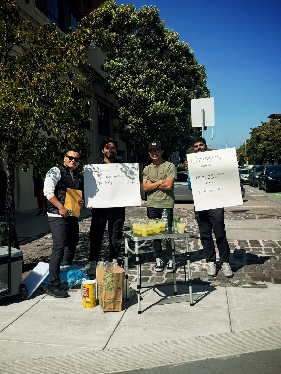 Catalyst founders selling on a San Francisco street corner during a work trial